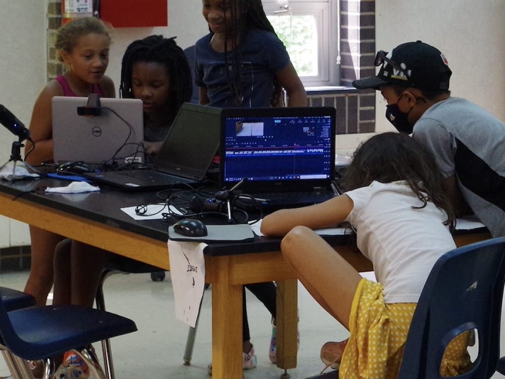 Kids working on laptops